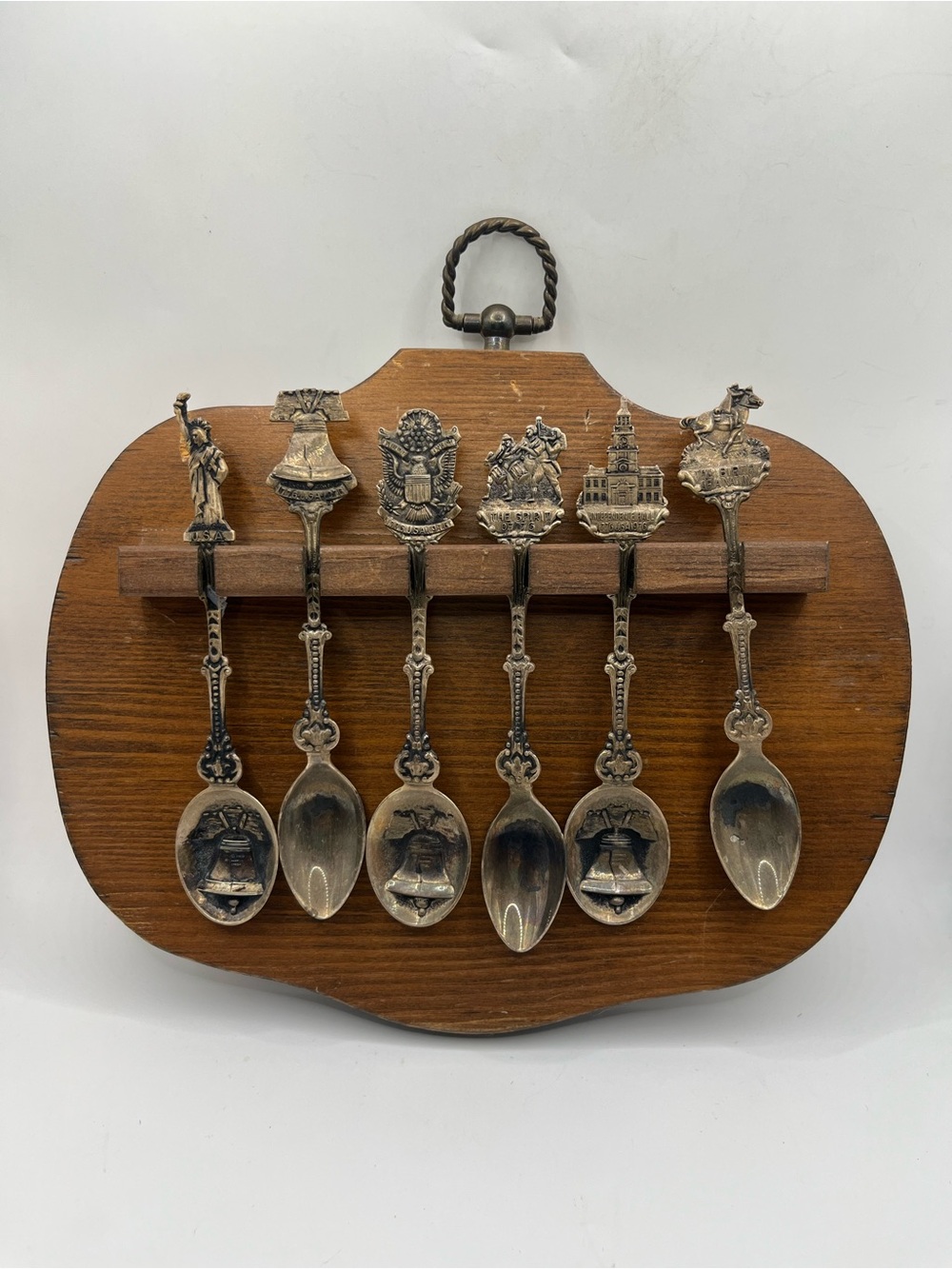 Vintage Collectible Souvenir Spoon Set on Wooden Display. American Landmarks